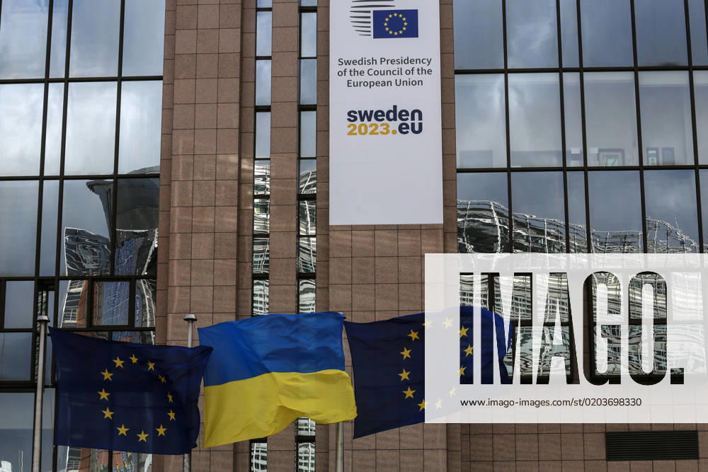 European and Ukrainian flags float outside the European Council headquarters in occasion of the one-year anniversary of Russia s invasion of Ukraine in Brussels, Belgium, February 25, 2023. Brussels Belgium - ZUMAm177 20230225_zip_m177_017