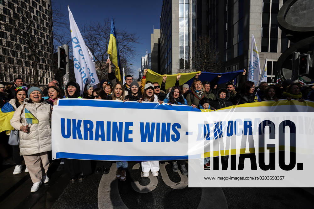 Demonstrators hold a banner reading Ukraine wins during a demonstration in occasion of the one-year anniversary of Russia s invasion of Ukraine in Brussels, Belgium, February 25, 2023. Brussels Belgium - ZUMAm177 20230225_zip_m177_019
