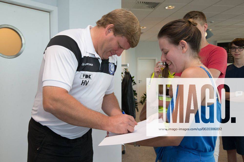 - GENT, BELGIUM: Gent s head coach Hein Vanhaezebrouck signs autographes during the fan day of Belgian first league soccer team KAA Gent, Saturday 11 July 2015, in Gent. KURTxDESPLENTER x04662144x