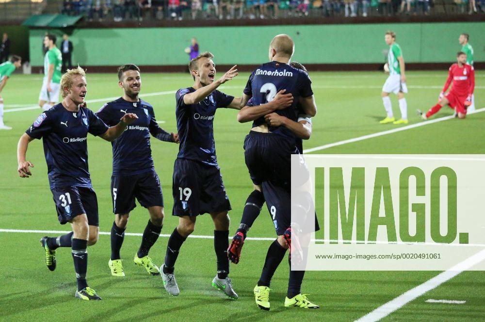 (150722) -- VILNIUS, July 22, 2015 -- Anton Tinnerholm (top) of Sweden s Malmo celebrates scoring with his teammates during the second leg match of second qualifying round of UEFA Champions League against Lithuania s Zalgiris in Vilnius, Lithuania on July 21, 2015. Malmo won 1-0 and advanced to the next round with 1-0 in aggregate. )(wll) (SP)LITHUANIA-VILNIUS-SOCCER-UEFA CHAMPIONS LEAGUE-QUALIFYING ROUND 2-MALMO VS ZALGIRIS BuxPeng