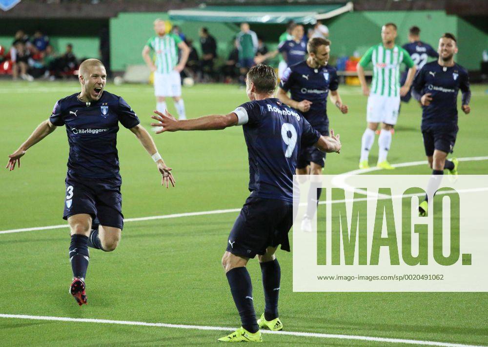 (150722) -- VILNIUS, July 22, 2015 -- Anton Tinnerholm (L) of Sweden s Malmo celebrates scoring with his teammate Markus Rosenberg during the second leg match of second qualifying round of UEFA Champions League against Lithuania s Zalgiris in Vilnius, Lithuania on July 21, 2015. Malmo won 1-0 and advanced to the next round with 1-0 in aggregate. )(wll) (SP)LITHUANIA-VILNIUS-SOCCER-UEFA CHAMPIONS LEAGUE-QUALIFYING ROUND 2-MALMO VS ZALGIRIS BuxPeng