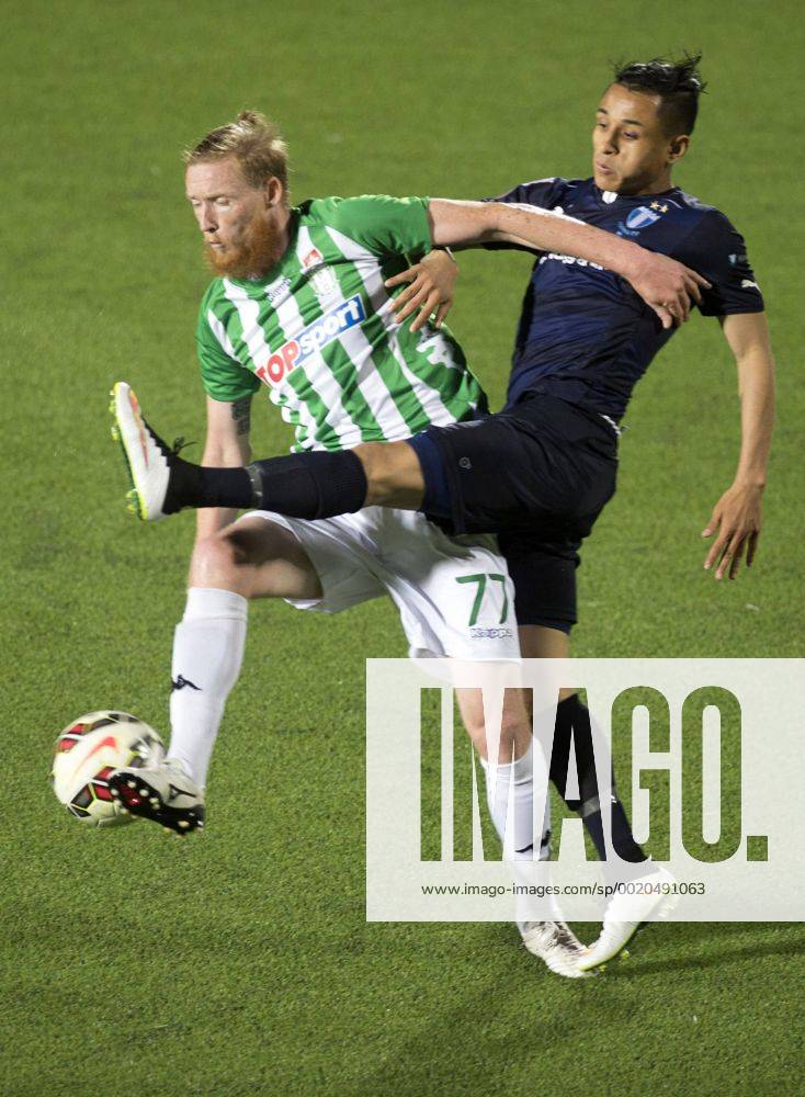 (150722) -- VILNIUS, July 22, 2015 -- Linas Pilibaitis (L) of Lithuania s Zalgiris breaks through during the second leg match of second qualifying round of UEFA Champions League against Sweden s Malmo in Vilnius, Lithuania on July 21, 2015. Malmo won 1-0 and advanced to the next round with 1-0 in aggregate. )(wll) (SP)LITHUANIA-VILNIUS-SOCCER-UEFA CHAMPIONS LEAGUE-QUALIFYING ROUND 2-MALMO VS ZALGIRIS AlfredasxPliadis