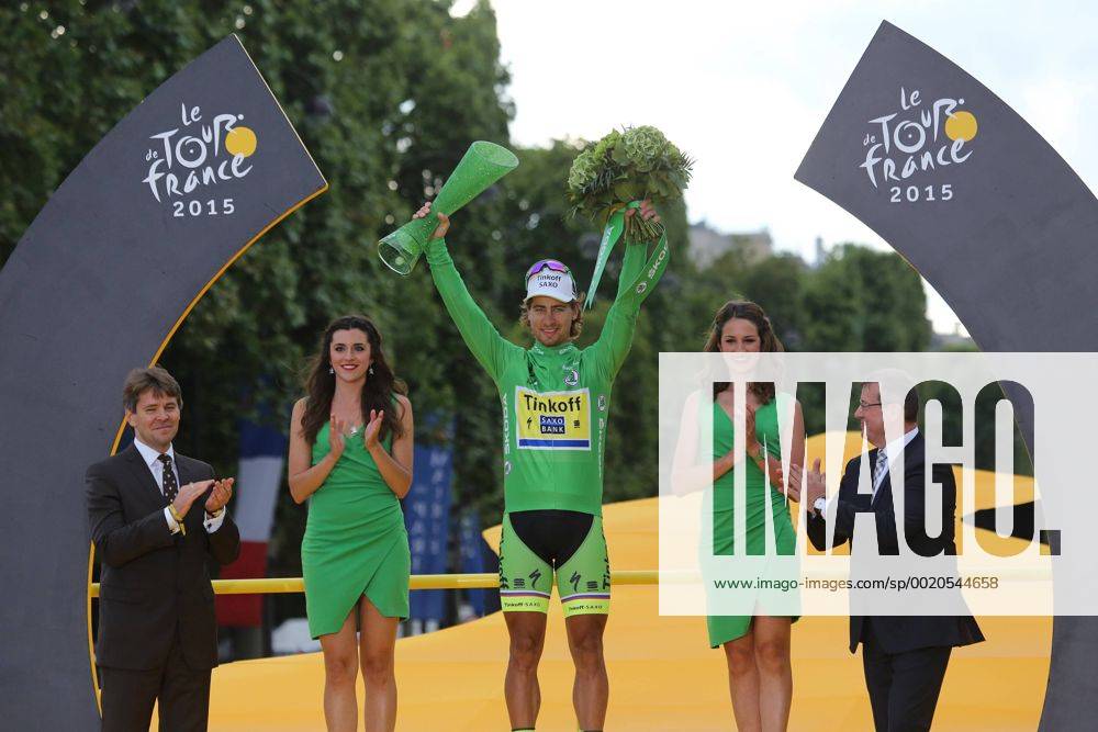 Peter Sagan of Slovakia celebrates on the presentation podium after winning the green jersey (overall points leader) at the Tour de France in Paris on July 26, 2015. Chris Froome of Great Britain claimed his second Tour de France victory, becoming the first Briton to do so. PAR20150726706 DAVIDxSILPA