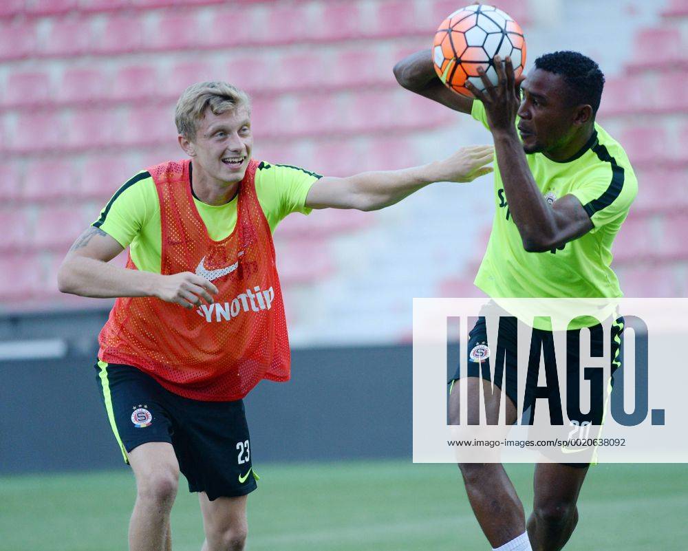 From left: soccer players Ladislav Krejci and Francis Litsingi train prior to the third qualifying round of the Champions League return match between Sparta Prague and CSKA Moscow in Prague, Czech Republic, on Tuesday, August 4, 2015. (CTKxPhoto MichalxDolezal) CTKPhotoP201508040708301 dol 009