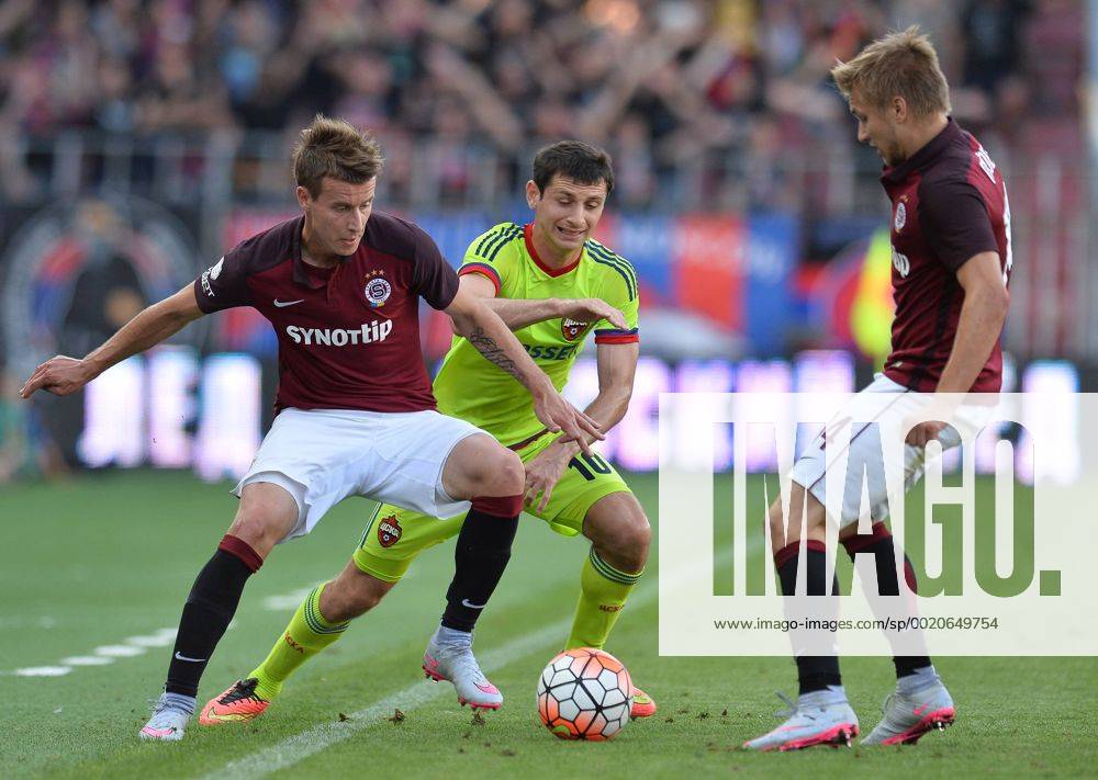 Lukas Marecek, of Sparta, left to right, Alan Dzagoev of CSKA Moscow and Martin Frydek of Sparta in action during the third qualifying round of the Champions League return match between AC Sparta Prague and CSKA Moscow in Prague, Czech Republic, on Wednesday, August 5, 2015. (CTKxPhoto KaterinaxSulova) CTKPhotoP201508050790001 Alan Dzagojev