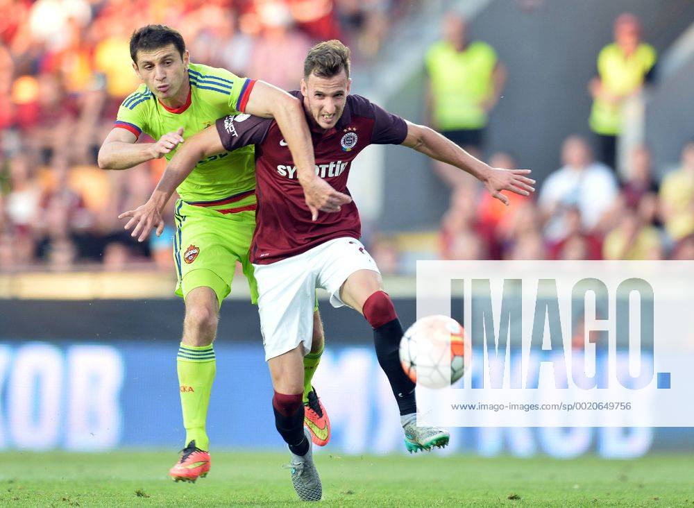 Alan Dzagoev, of CSKA Moscow, left to right, and Matej Hybs of Sparta in action during the third qualifying round of the Champions League return match between AC Sparta Prague and CSKA Moscow in Prague, Czech Republic, on Wednesday, August 5, 2015. (CTKxPhoto KaterinaxSulova) CTKPhotoP201508050808501 suk7