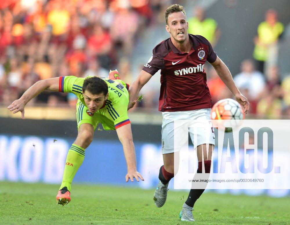 Alan Dzagoev, of CSKA Moscow, left to right, and Matej Hybs of Sparta in action during the third qualifying round of the Champions League return match between AC Sparta Prague and CSKA Moscow in Prague, Czech Republic, on Wednesday, August 5, 2015. (CTKxPhoto KaterinaxSulova) CTKPhotoP201508050808601 suk8