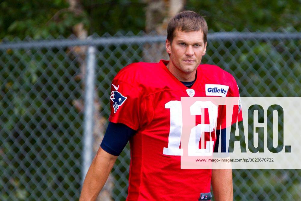 New England Patriots quarterback Tom Brady (12) takes the field during NFL American Football Herren USA training camp at Gillette Stadium. NFL 2015: Patriots Training Camp AUG 07 - ZUMAc04_