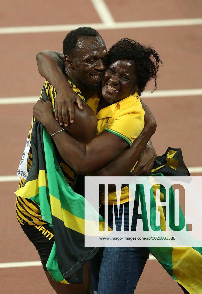 (CHINA OUT) Usain Bolt of Jamaica celebrates with mother Jennifer Bolt after winning gold in the Men s 100 metres final during day two of the 15th IAAF World Athletics Championships Beijing 2015 at Beijing National Stadium on August 23, 2015 in Beijing, China. CFP471809850