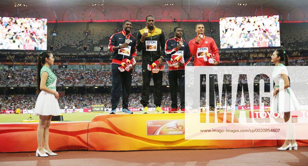 Aktuell Leichtathletik WM in Peking, 100m der Herren, Siegerehrung BEIJING, CHINA - AUGUST 24: (CHINA OUT) (L - R) Silver medalist Justin Gatlin of the United States, gold medalist Usain Bolt of Jamaica and joint bronze medalists Trayvon Bromell of the United States and Andre De Grasse of Canada pose on the podium during the medal ceremony for the Men s 100 metres final during day three of the 15th IAAF World Athletics Championships Beijing 2015 at Beijing National Stadium on August 24, 2015 in Beijing, China. CFP471846174