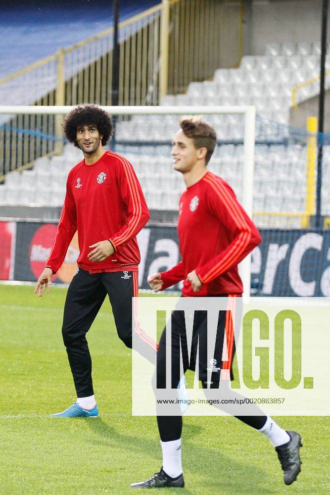 - BRUGGE, BELGIUM: Manchester s Marouane Fellaini and Manchester s Adnan Januzaj pictured during a training session of British soccer club Manchester United ManU in Brugge, Tuesday 25 August 2015. Tomorrow Belgian first league soccer team Club Brugge will play the return game of the play-offs of the Uefa Champions League competition against British soccer club Manchester United FC. Manchester United won the first leg 3-1. BRUNOxFAHY x04687067x