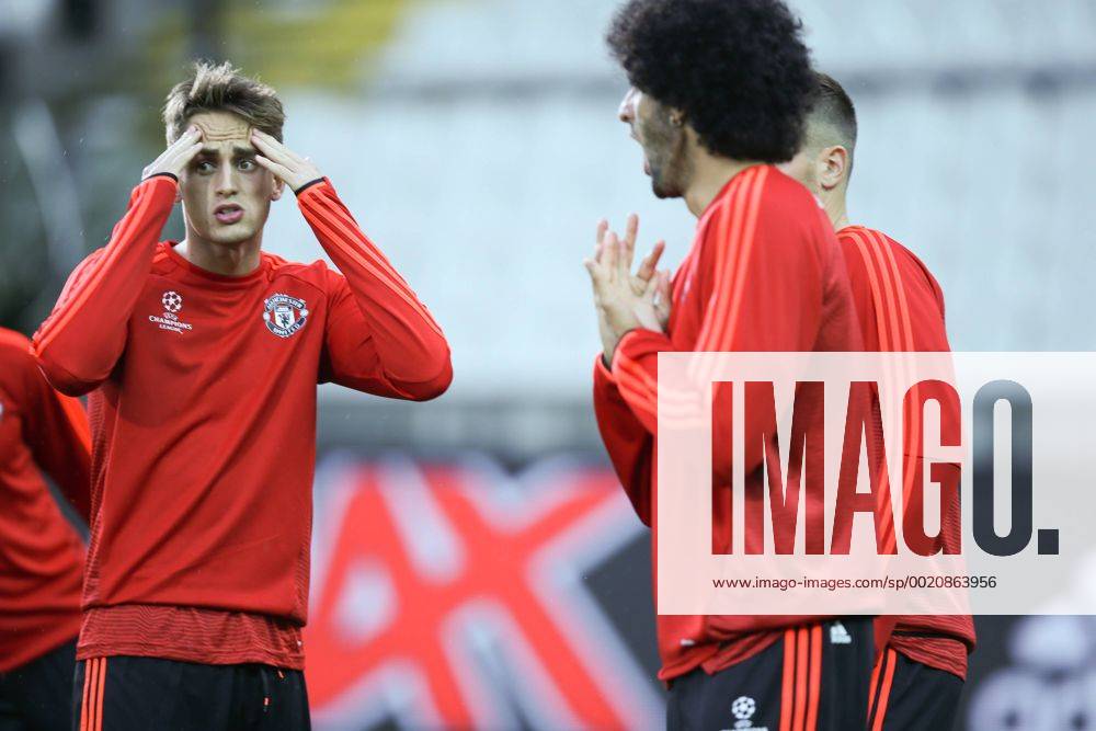 - BRUGGE, BELGIUM: Manchester s Adnan Januzaj and Manchester s Marouane Fellaini pictured during a training session of British soccer club Manchester United ManU in Brugge, Tuesday 25 August 2015. Tomorrow Belgian first league soccer team Club Brugge will play the return game of the play-offs of the Uefa Champions League competition against British soccer club Manchester United FC. Manchester United won the first leg 3-1. BRUNOxFAHY x04687017x