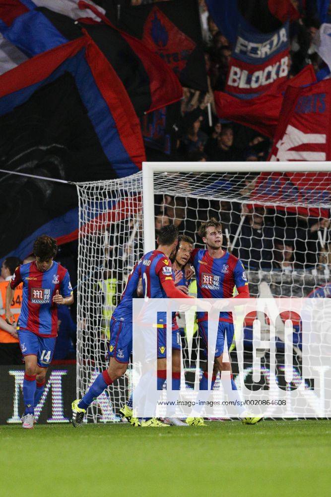 London, England. Capital One Cup 2nd Round. Crystal Palace versus Shrewsbury. Crystal Palace& x2019;s Dwight Gayle celebrates with teammates after scoring a penalty to level the scores at 1-1 Mercerx ActionPlus11653615