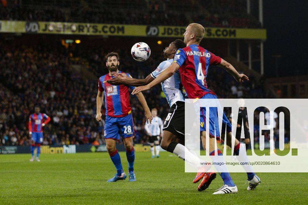 London, England. Capital One Cup 2nd Round. Crystal Palace versus Shrewsbury. Shrewsbury Town s Jean-Louis Akpa Akpro shields the ball from Crystal Palace& x2019;s Brede Hangeland Mercerx ActionPlus11653617