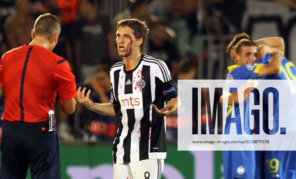 Belgrade(Serbia) FK Partizsan-FC bate Borisov Play off 2nd leg champions league men s football Darko Brasanac(c) FK Partizan bloody after match while Bate Borisov players celebrate behind :