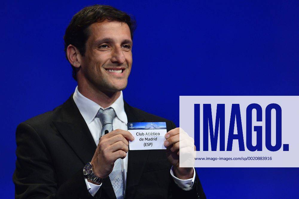 Aug. 27, 2015 - Monaco, Monaco - JULIANO BELLETTI ex Barcelona soccer player shows the draw result of Club Atletico de Madrid during the UEFA Champions League Draws 2015 - 16 at Grimaldi Forum. Soccer 2015 - UEFA Champions League 2015 - 16 Draw - ZUMAm119