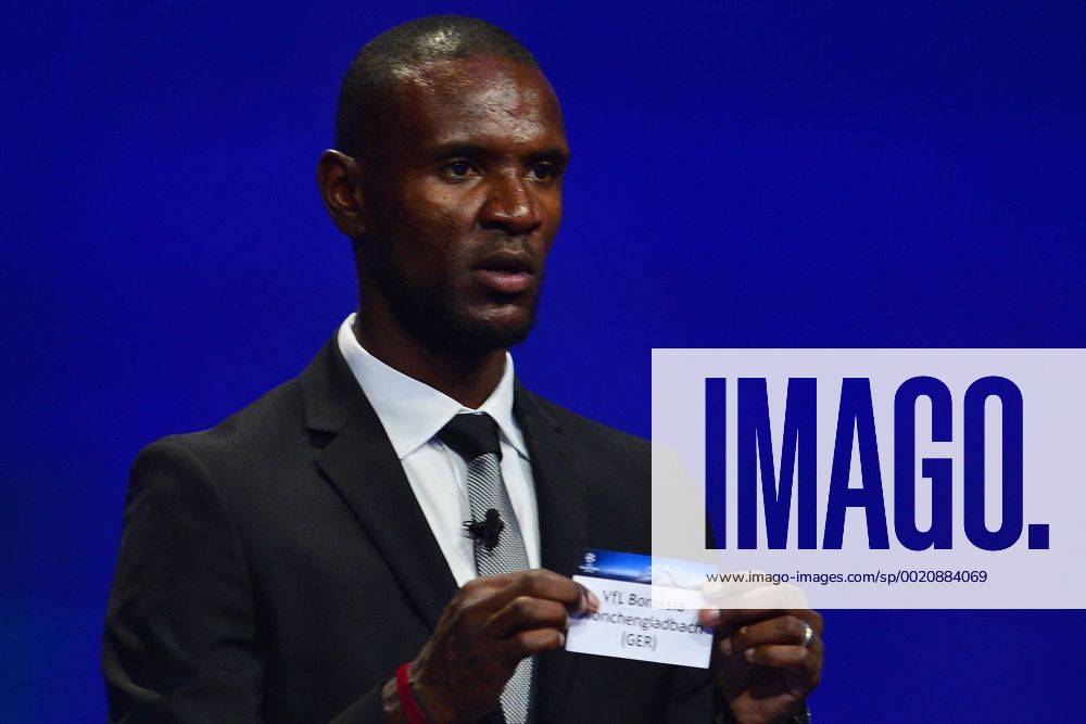 Aug. 27, 2015 - Monaco, Monaco - ERIC ABIDAL ex Barcelona soccer player shows the draw result of VFL Borussia Monchengladbach during the UEFA Champions League Draws 2015 - 16 at Grimaldi Forum. Soccer 2015 - UEFA Champions League 2015 - 16 Draw - ZUMAm119