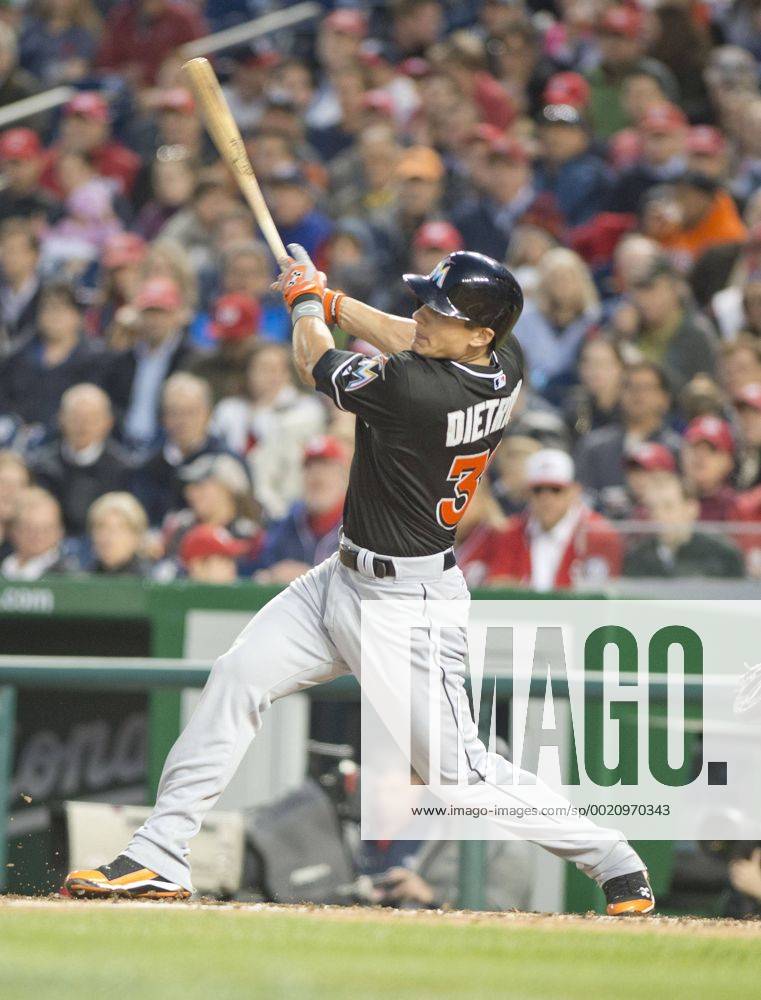 Washington, District Of Columbia, U.S - Miami Marlins second baseman Derek Dietrich (32) hits a home run in the second inning against the Washington Nationals making the score 5 - 0 at Nationals Park in Washington, D.C. on Wednesday, April 9, 2014. MLB Baseball Herren USA 2014 - Marlins Beat Nationals 7-1 - ZUMAp124