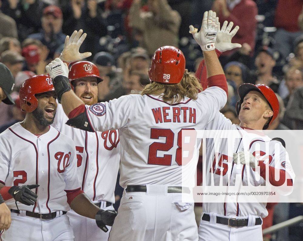 Washington, District Of Columbia, U.S - Washington Nationals right fielder Jayson Werth (28) is congratulated by teammates Denard Span (2), Adam LaRoche (25), and Nate McLouth (15) after hitting a grand slam home run in the eighth inning against the Florida Marlins at Nationals Park in Washington, D.C. on Wednesday, April 9, 2014. The Nationals won the game 10 - 7. MLB Baseball Herren USA 2014 - Marlins Beat Nationals 7-1 - ZUMAp124