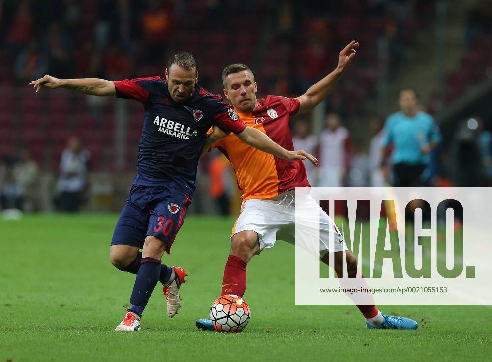 Turkey superlig match between Galatasaray and Mersin Idman Yurdu at Turk Telekom Arena Stadium in Istanbul on september 12, 2015. Final Score: Galatasaray 1 - Mersin Idman Yurdu 1 Pictured: Sekan Balci of Galatasaray and Lukas Podolski (R) of Mersin Idman Yurdu.