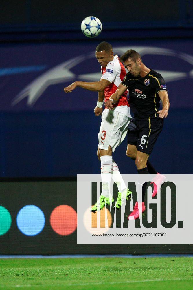 SOCCER - CL, Zagreb vs Arsenal ZAGREB,CROATIA,16.SEP.15 - SOCCER - UEFA Champions League, group stage, GNK Dinamo Zagreb vs FC Arsenal. Image shows Kieran Gibbs (Arsenal) and Ivo Pinto (Zagreb). GEPAxpictures Klansek