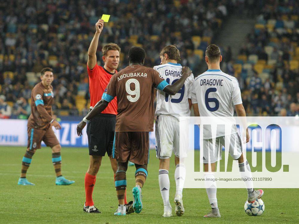 Sept. 16, 2015 - Kiev, Ukraine - Referee Felix Brych shows a yellow card during the UEFA Champions League Group G stage football match between FC Dynamo Kyiv and FC Porto at NSK Olimpiyskyi Stadium in Kyiv on September 16, 2015. Champions League: FC Dynamo Kyiv vs FC Porto - ZUMAn230