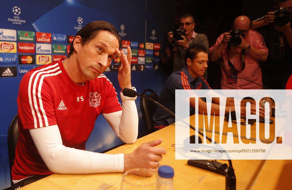 Chicharito Javier Hernandez and Roger Schmidt (Bayer Leverkusen) attend press conference before the Champions League match. xFRANCESCxADELANTADOx
