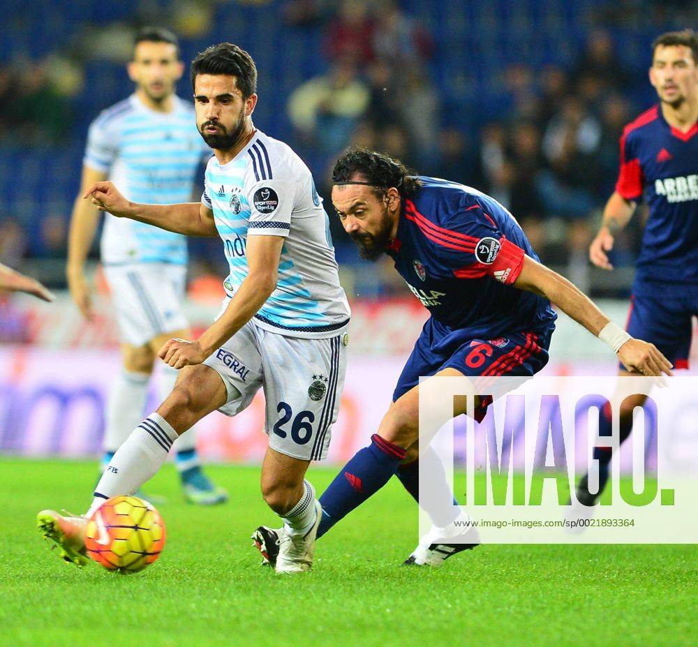 Turkey superlig match between Mersin Idman Yurdu and Fenerbahce in Mersin on November 21,2015. Final Score: Mersin Idman Yurdu 1 - Fenerbahce 3 Pictured: Servet Cetin (R) of Mersin Idman Yurdu and Alper Potuk of Fenerbahce.