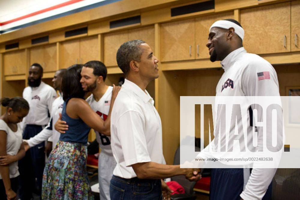 Washington, District of Columbia, U.S. - President BARACK OBAMA talks with LEBRON JAMES as First Lady MICHELLE OBAMA hugs DERON WILLIAMS during their greet with members of the U.S. Men s Olympic basketball team at halftime of their game against Brazil at the Verizon Center. - ZUMAz03 July 16 2012 Washington District of Columbia U S President Barack Obama Talks With Lebron James As First Lady Michelle Obama Hugs DERON Williams during their Greet With Members of The U S Men S Olympic Basketball Team AT Halftime of their Game against Brazil AT The Verizon Center ZUMAz03 July 16 2012 Washington District of Columbia U S President BARACK OBAMA talks with LEBRON JA - ZUMA1
