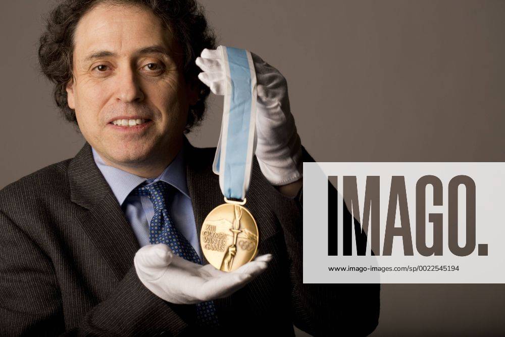 Jan. 15, 2016 - Toronto, ON, Canada - TORONTO, ON- JANUARY 15:.Robert Livingston photographed with Bo Berglund s 1980 Olympic silver medal that is up for auction.. Olymic memorabilia auction - ZUMAt14_