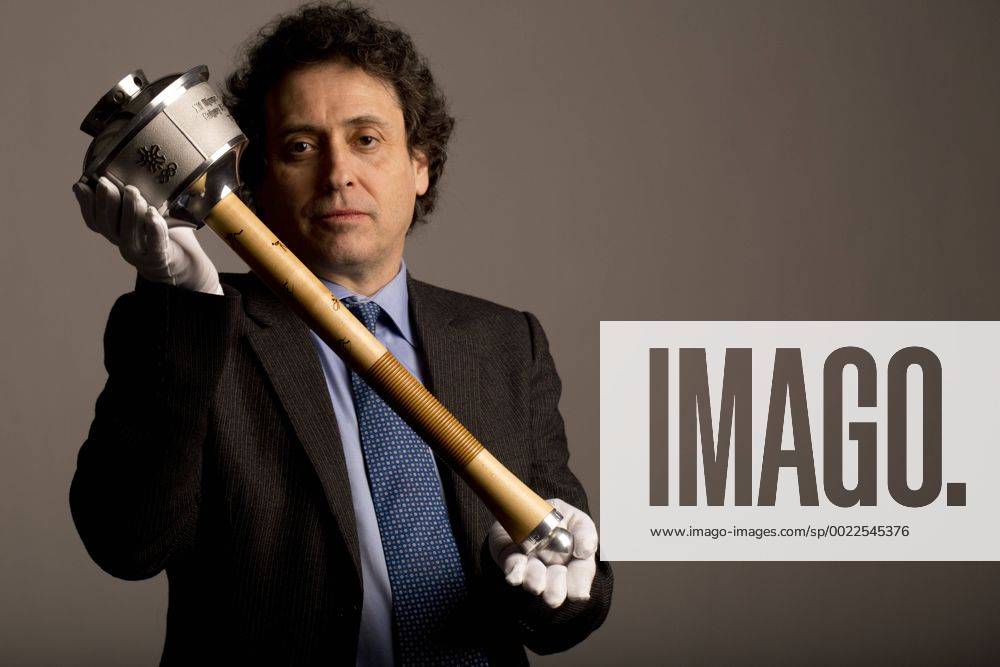 Jan. 15, 2016 - Toronto, ON, Canada - TORONTO, ON- JANUARY 15:.Robert Livingston photographed with the 1988 Olympic torch that is up for auction.. Olymic memorabilia auction - ZUMAt14_