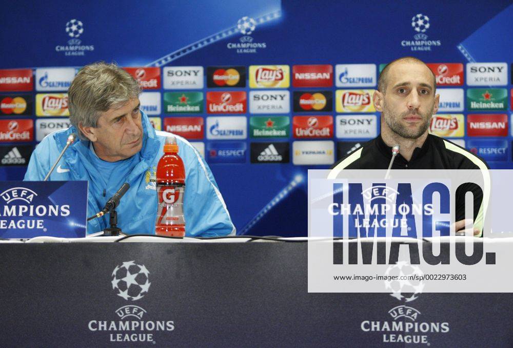 Feb. 23, 2016 - Kiev, Ukraine - Manchester City s manager Manuel Pellegrini (L) and player Pablo Zabaleta (R) speaks during their a press conference PK Pressekonferenz at Olimpiyskiy stadium,in Kiev,Ukraine,23 February,2016. Manchester City will face Dynamo Kyiv in the UEFA Champions League round of 16 football match,on 24 February,2016. FC Manchester City Press Conference and Training Session - ZUMAn230