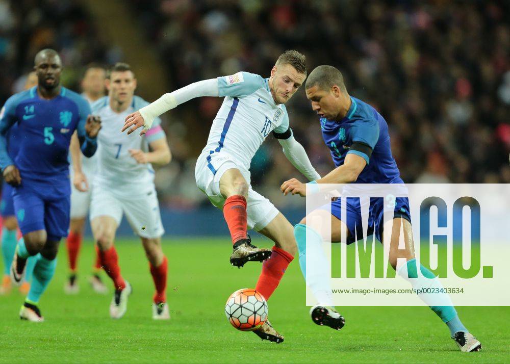 Wembley Stadium, London, England. International Football Friendly England versus Netherlands. England Forward Jamie Vardy challenges Netherlands Defender Jeffrey Bruma Kertonx ActionPlus11723317