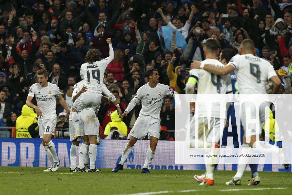 Real Madrid s Portuguese forward Cristiano Ronaldo (C) celebrates one of his two goals for the team during a Champions League quarter final second leg match between Real Madrid and Wolfsburg held at Santiago Bernabeu Stadium in Madrid, Spain, 12 April 2016. REAL MADRID VS WOLFSBURGO !ACHTUNG: NUR REDAKTIONELLE NUTZUNG! RMD016 20160412-635960937934698358