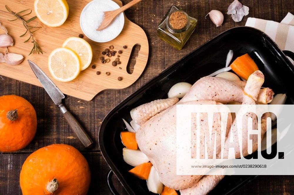 Top view chicken pan with lemon slices thanksgiving