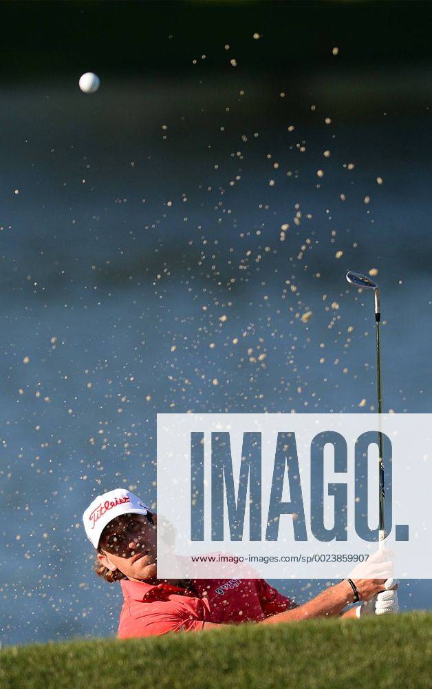 Charlotte, NC, USA - Andrew Loupe watches the flight of his ball from a sand trap along the 14th green during second round action of the Wells Fargo Championship at Quail Hollow Club on May 6, 2016 in Charlotte, N.C. Loupe finished the round at -8. Wells Fargo Championship - ZUMAm67_