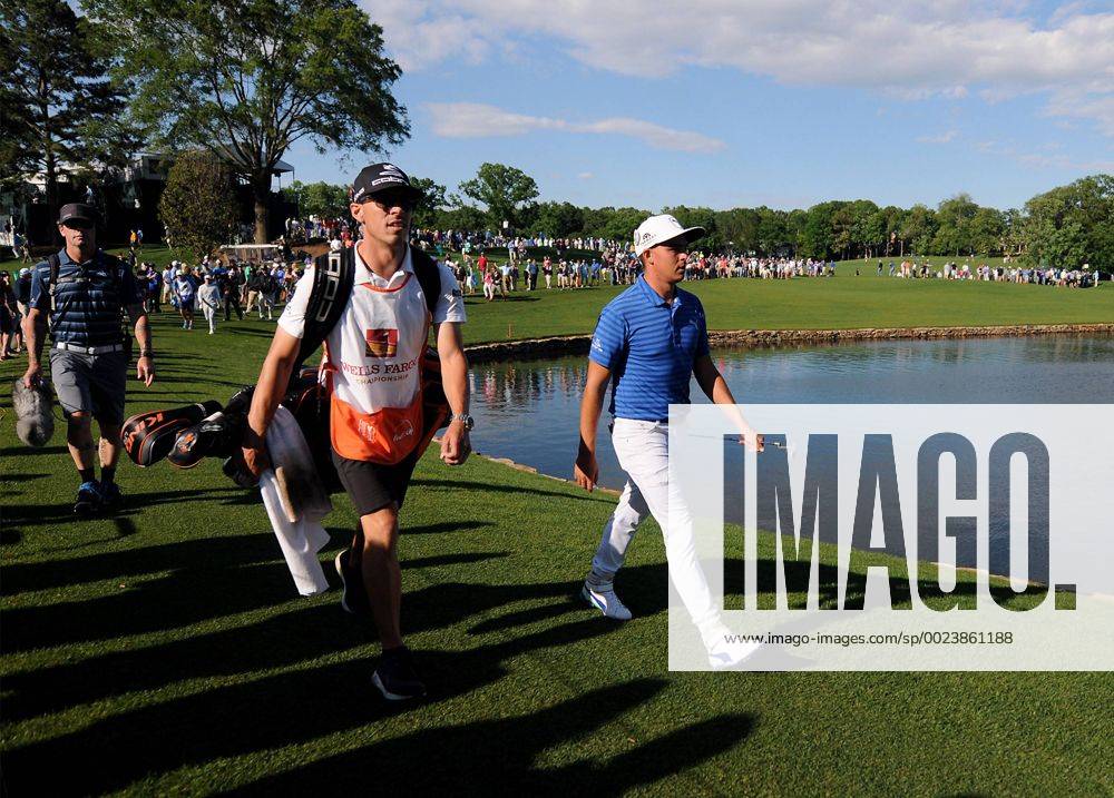 Charlotte, NC, USA - Rickie Fowler, right, walks to the 17th green during the second round of the Wells Fargo Championship at Quail Hollow Club on Friday, May 6, 2016, in Charlotte, N.C. Wells Fargo Championship - ZUMAm67_