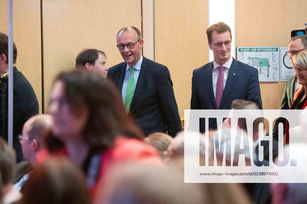 Friedrich MERZ, CDU Chairman, Hendrik WUEST, Wüst, CDU, State Premier of North Rhine-Westphalia, enter the hall, Regional Conference on the New Basic Program of the CDU in Muenster