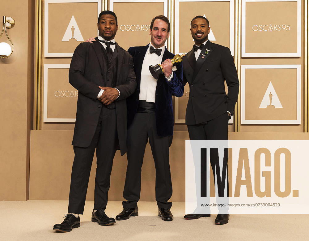 (L-R) Jonathan Majors, James Friend and Michael B. Jordan pose in the press room of the 95th edition of the Academy Awards ceremony, at the Dolby Theater in Hollywood, USA, 12 March 2023. James Friend won the Oscar for Best Cinematography for the film All Quiet On The Western Front . 95th edition of the Academy Awards in Hollywood !ACHTUNG: NUR REDAKTIONELLE NUTZUNG!