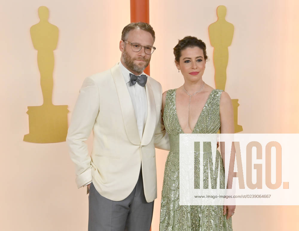(L-R) Seth Rogen and Lauren Miller attend the 95th annual Academy Awards at the Dolby Theatre in the Hollywood section of Los Angeles on Sunday, March 12, 2023. LAP2023031211281 JIMxRUYMEN
