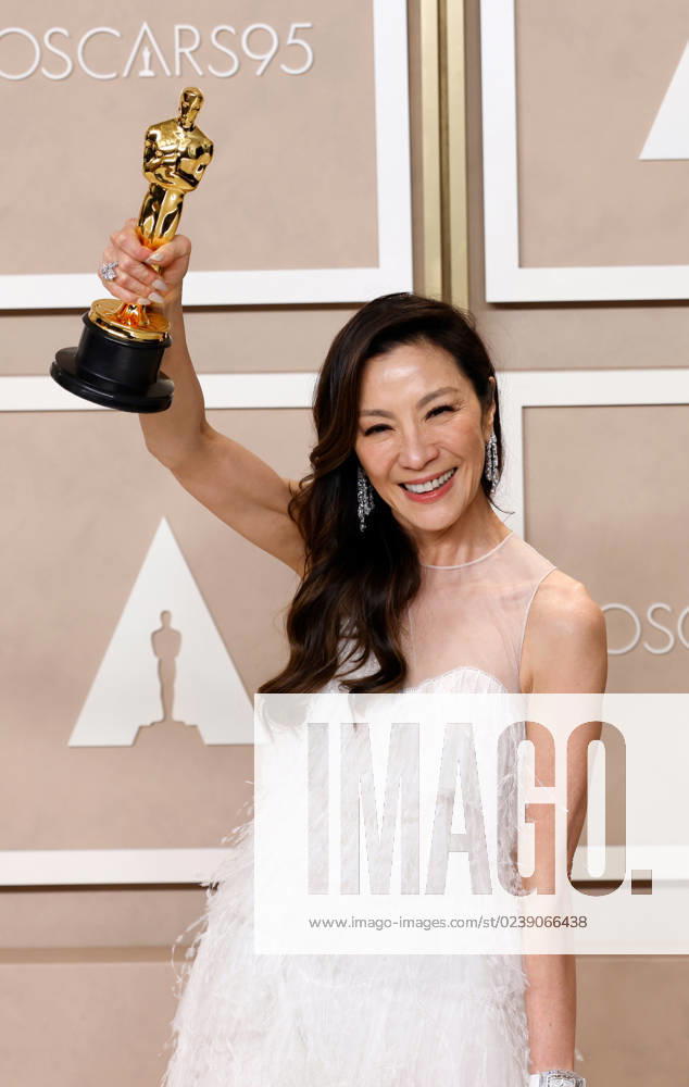 Michelle Yeoh, winner of the award for Best Actress in a Leading Role for Everything Everywhere All at Once, appears backstage with her Oscar during the 95th annual Academy Awards at Loews Hollywood Hotel in the Hollywood section of Los Angeles on Sunday, March 12, 2023. LAP20230312286 JOHNxANGELILLO