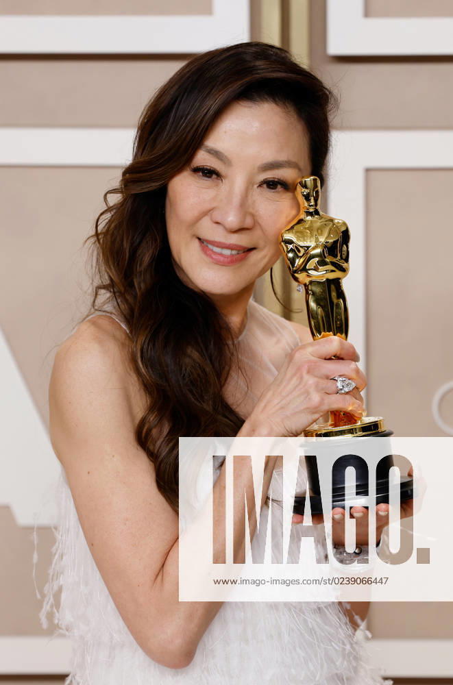 Michelle Yeoh, winner of the award for Best Actress in a Leading Role for Everything Everywhere All at Once, appears backstage with her Oscar during the 95th annual Academy Awards at Loews Hollywood Hotel in the Hollywood section of Los Angeles on Sunday, March 12, 2023. LAP20230312284 JOHNxANGELILLO