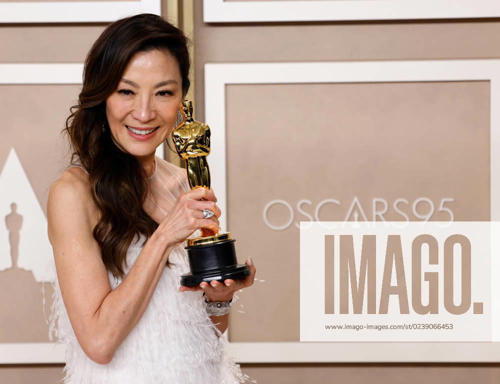 Michelle Yeoh, winner of the award for Best Actress in a Leading Role for Everything Everywhere All at Once, appears backstage with her Oscar during the 95th annual Academy Awards at Loews Hollywood Hotel in the Hollywood section of Los Angeles on Sunday, March 12, 2023. LAP20230312285 JOHNxANGELILLO