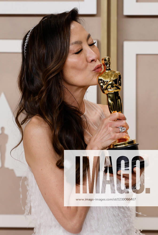 Michelle Yeoh, winner of the award for Best Actress in a Leading Role for Everything Everywhere All at Once, appears backstage with her Oscar during the 95th annual Academy Awards at Loews Hollywood Hotel in the Hollywood section of Los Angeles on Sunday, March 12, 2023. LAP20230312288 JOHNxANGELILLO