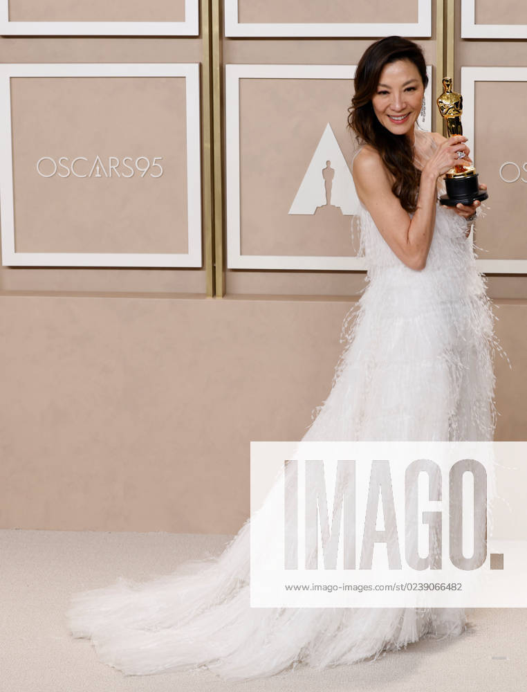 Michelle Yeoh, winner of the award for Best Actress in a Leading Role for Everything Everywhere All at Once, appears backstage with her Oscar during the 95th annual Academy Awards at Loews Hollywood Hotel in the Hollywood section of Los Angeles on Sunday, March 12, 2023. LAP20230312292 JOHNxANGELILLO