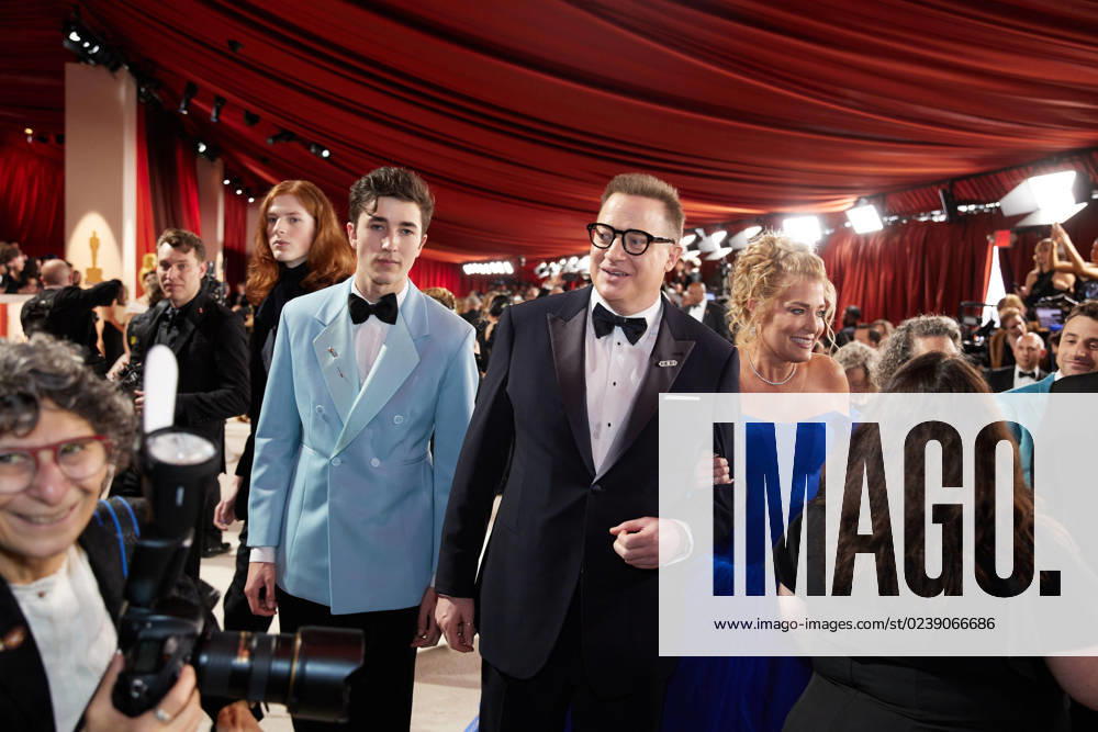 Oscar® nominee Brendan Fraser (2nd from R) arrives with Leland Fraser (Far L), Holden Fraser, and Jeanne Moore on the red carpet of the 95th Oscars® at the Dolby® Theatre at Ovation Hollywood on Sunday