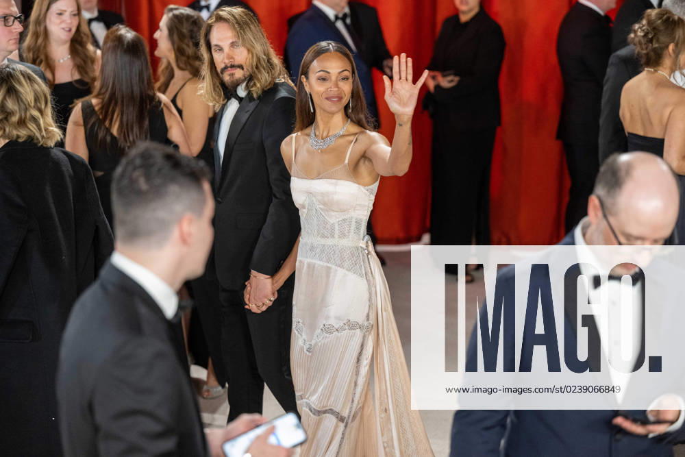 Marco Perego Saldana and Zoe Saldana arrive on the red carpet of the 95th Oscars® at the Dolby® Theatre at Ovation Hollywood on Sunday