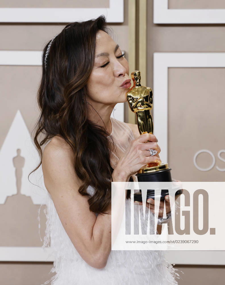 Michelle Yeoh, winner of the award for Best Actress in a Leading Role for Everything Everywhere All at Once, appears backstage with her Oscar during the 95th annual Academy Awards at Loews Hollywood Hotel in the Hollywood section of Los Angeles on Sunday, March 12, 2023. LAP202303125005 JohnxAngelillo