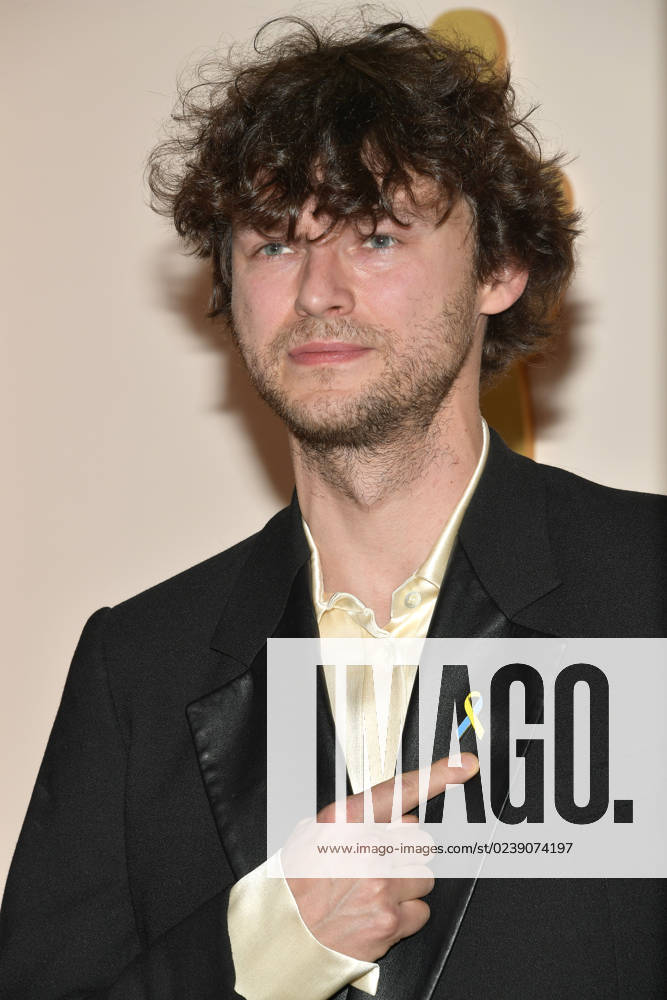 LOS ANGELES, CA - MARCH 12: Mateusz Ko?ciukiewicz at the 95th Academy Awards at the Dolby Theater in Los Angeles, California on March 12, 2023.