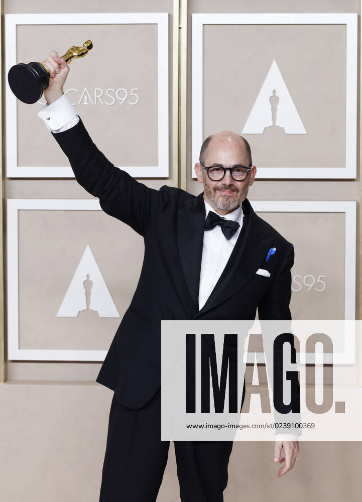 Edward Berger, winner of the award for Best International Feature Film for All Quiet on the Western Front, appears backstage with his Oscar during the 95th annual Academy Awards at Loews Hollywood Hotel in the Hollywood section of Los Angeles on Sunday, March 12, 2023. LAP202303128125 JohnxAngelillo